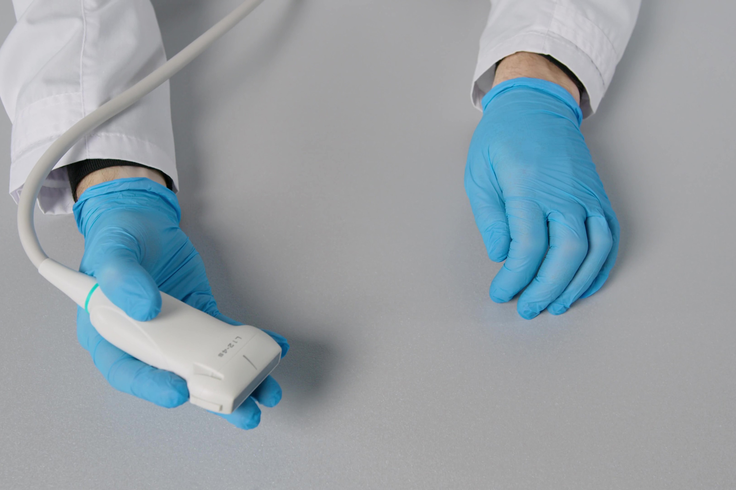 Как правильно держать датчик УЗИ и избежать тремора?